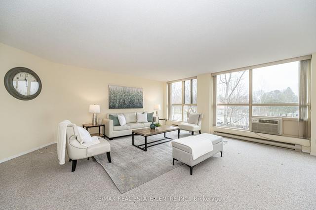 205 - 24 Marilyn Dr, Condo with 3 bedrooms, 2 bathrooms and 1 parking in Guelph ON | Image 20