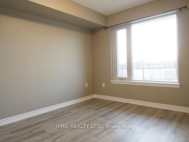 312 - 716 Main St E, Condo with 1 bedrooms, 1 bathrooms and 1 parking in Milton ON | Image 5