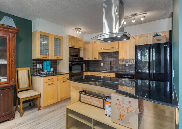 124 - 3219 56 St Ne, Home with 3 bedrooms, 1 bathrooms and 2 parking in Calgary AB | Image 11