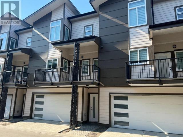 13 - 1354 Rutland Rd N, House attached with 3 bedrooms, 3 bathrooms and 2 parking in Kelowna BC | Image 1