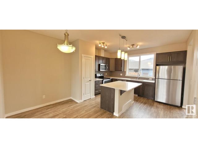1911 24 St Nw, House attached with 4 bedrooms, 3 bathrooms and null parking in Edmonton AB | Image 4