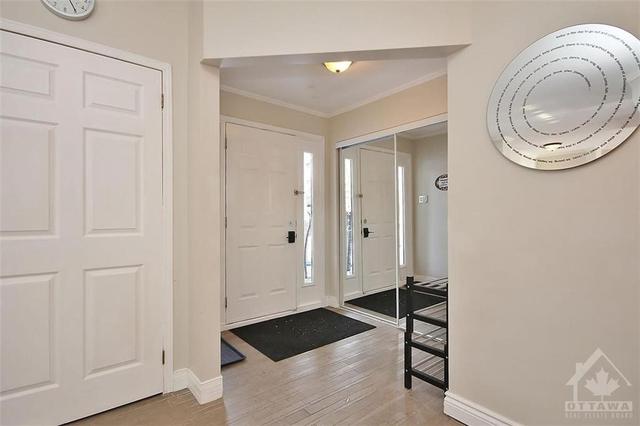 Spacious Foyer with over sized coat cupboard. | Image 7