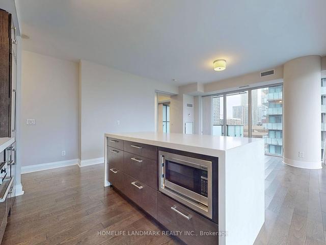 1702 - 65 St Mary St, Condo with 2 bedrooms, 2 bathrooms and 1 parking in Toronto ON | Image 2