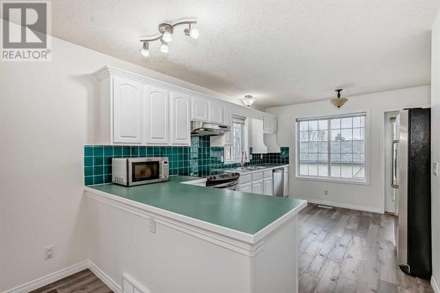 4 West Hall Pl, House detached with 4 bedrooms, 3 bathrooms and 4 parking in Cochrane AB | Image 18