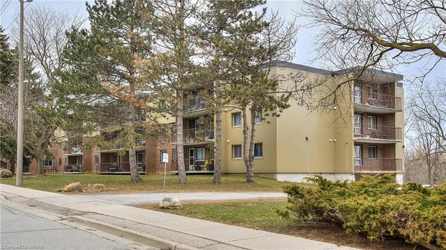 101 - 30 Avalon Pl, House attached with 2 bedrooms, 1 bathrooms and 1 parking in Kitchener ON | Image 1