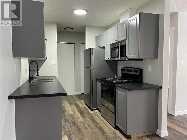 302A - 5611 10 Ave, Condo with 2 bedrooms, 1 bathrooms and 1 parking in Edson AB | Image 4