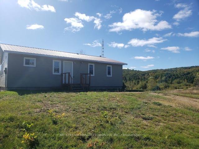 117 Hickey Rd W, House detached with 2 bedrooms, 2 bathrooms and 20 parking in Hastings Highlands ON | Image 23