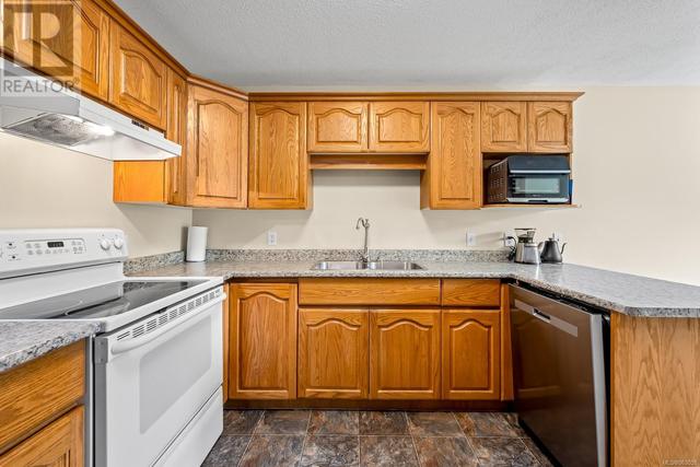 102 - 1400 Tunner Dr, House attached with 2 bedrooms, 2 bathrooms and null parking in Courtenay BC | Image 7