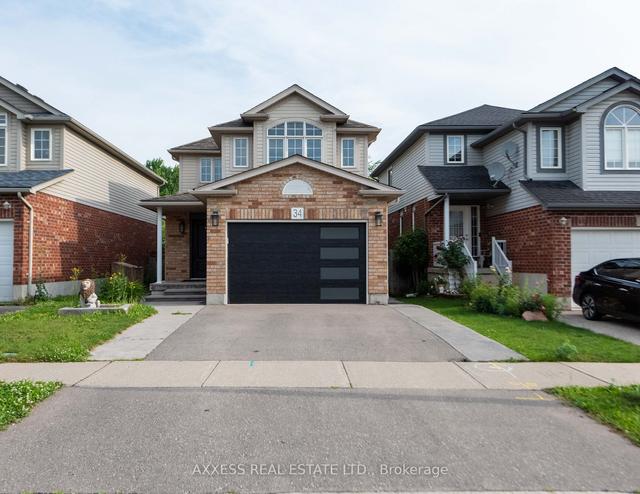 34 Peach Blossom Cres, House detached with 4 bedrooms, 3 bathrooms and 2 parking in Kitchener ON | Image 1