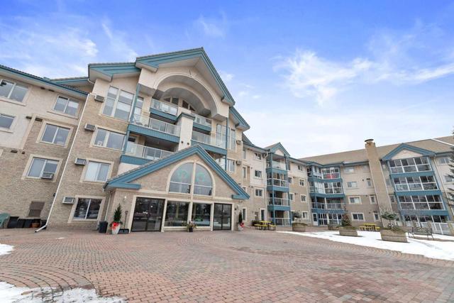 232 - 7229 Sierra Morena Blvd Sw, Condo with 2 bedrooms, 2 bathrooms and 1 parking in Calgary AB | Image 1