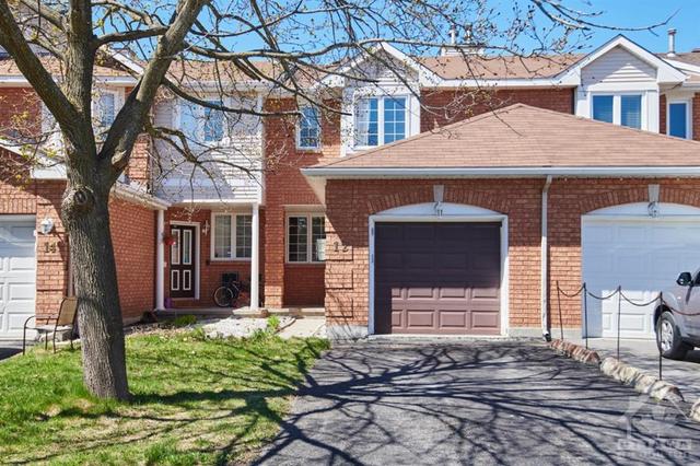 12 Woodpark Way, Townhouse with 4 bedrooms, 3 bathrooms and 3 parking in Ottawa ON | Image 1
