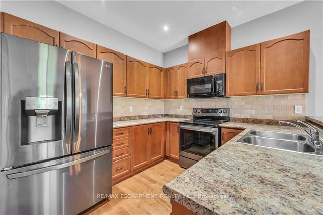37 - 310 Southbrook Dr, Townhouse with 2 bedrooms, 2 bathrooms and 3 parking in Hamilton ON | Image 8