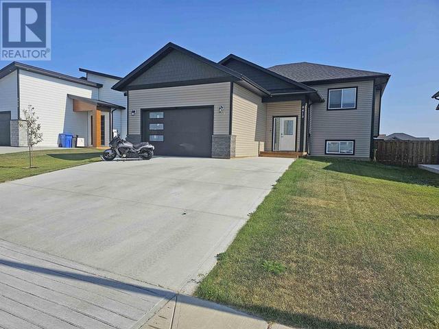 8415 81a St, House detached with 5 bedrooms, 3 bathrooms and null parking in Fort St. John BC | Image 1