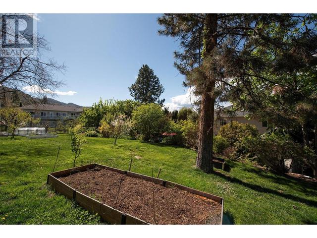291 Sandpiper Crt, House detached with 5 bedrooms, 3 bathrooms and 6 parking in Kelowna BC | Image 70