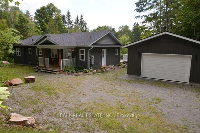 405 Philrick Dr, House detached with 3 bedrooms, 2 bathrooms and 4 parking in Trent Lakes ON | Image 23