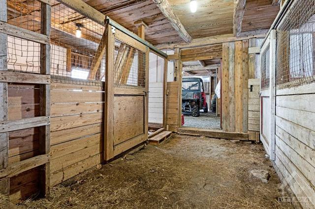 Big barn has 6 horse stalls and 11' ceiling | Image 8