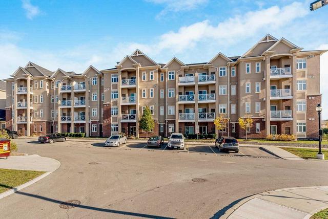 107 - 1360 Costigan Rd, Condo with 1 bedrooms, 1 bathrooms and 1 parking in Milton ON | Image 1