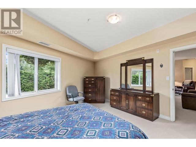 106 - 1961 Durnin Rd, Condo with 2 bedrooms, 2 bathrooms and 1 parking in Kelowna BC | Image 22