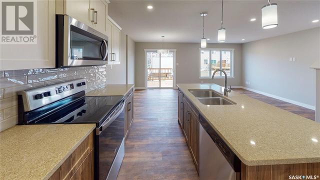 218 Schmeiser Bend, House semidetached with 3 bedrooms, 3 bathrooms and null parking in Saskatoon SK | Image 5
