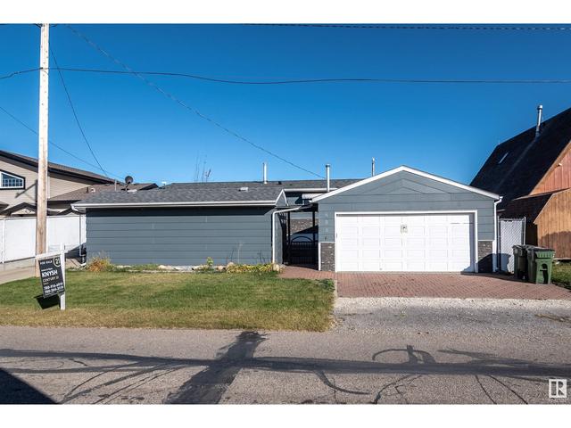 6806 50 Av, House detached with 3 bedrooms, 2 bathrooms and null parking in Val Quentin AB | Image 41