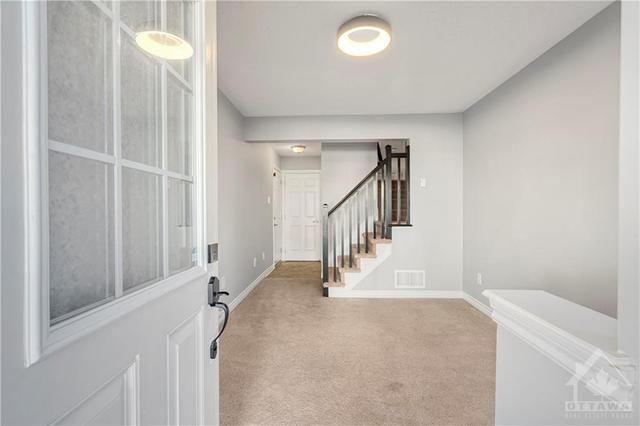 2615 Baynes Sound Way, Townhouse with 3 bedrooms, 2 bathrooms and 3 parking in Ottawa ON | Image 3