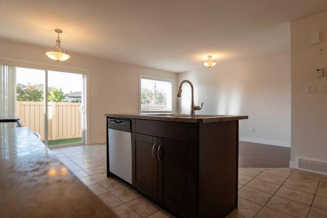 1 - 213 Silkstone Rd W, Home with 3 bedrooms, 2 bathrooms and 2 parking in Lethbridge AB | Image 8