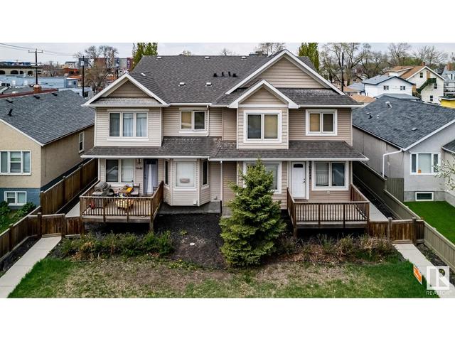 9648 106 Ave Nw, House attached with 4 bedrooms, 2 bathrooms and null parking in Edmonton AB | Image 1