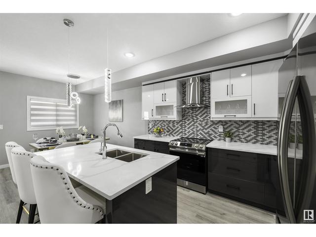 61 - 130 Hawks Ridge Bv Nw, House attached with 4 bedrooms, 3 bathrooms and null parking in Edmonton AB | Image 12