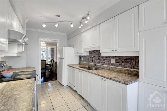 12 Woodpark Way, Townhouse with 4 bedrooms, 3 bathrooms and 3 parking in Ottawa ON | Image 6