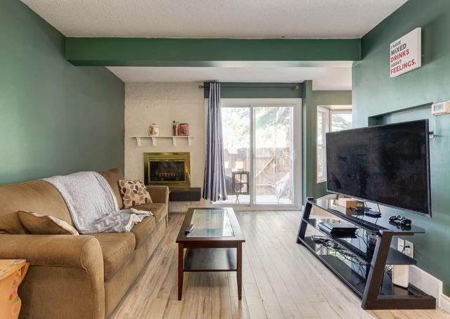 124 - 3219 56 St Ne, Home with 3 bedrooms, 1 bathrooms and 2 parking in Calgary AB | Image 8