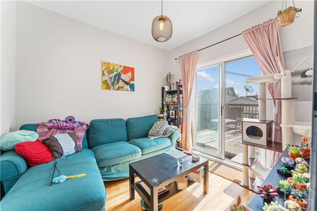 Unit 2 - front balcony & a spacious & sunny back terrace! | Image 13