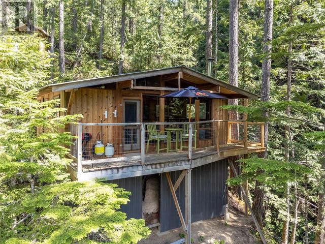 42 Baikie Dr, House detached with 2 bedrooms, 1 bathrooms and 2 parking in Strathcona D (Oyster Bay   Buttle Lake) BC | Image 55