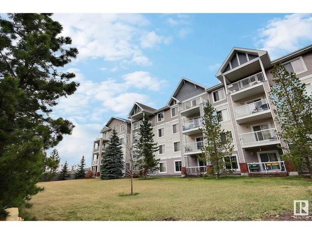 114 - 13710 150 Ave Nw, Condo with 2 bedrooms, 2 bathrooms and null parking in Edmonton AB | Image 1