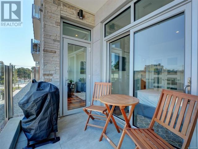 Glass wrapped balcony with space to relax and BBQ. | Image 23