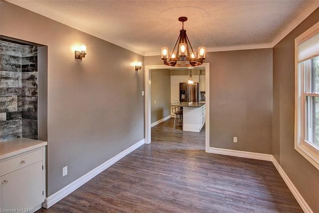 Foyer Entrance with a Large Closet and 2 Piece Bathroom | Image 3