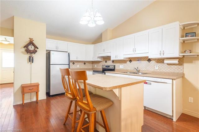 24 - 35 Cobden Crt, House attached with 2 bedrooms, 2 bathrooms and 2 parking in Brantford ON | Image 2