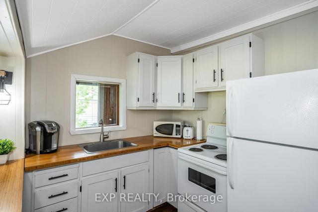 235 Monck Rd, House detached with 3 bedrooms, 1 bathrooms and 10 parking in Kawartha Lakes ON | Image 7