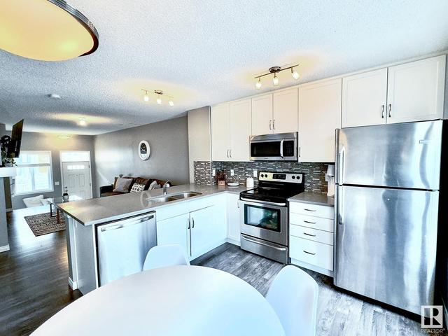 120 - 2905 141 St Sw, House attached with 2 bedrooms, 2 bathrooms and 2 parking in Edmonton AB | Image 4