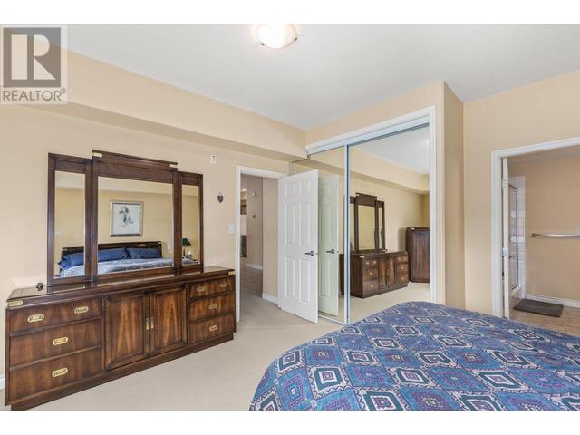 106 - 1961 Durnin Rd, Condo with 2 bedrooms, 2 bathrooms and 1 parking in Kelowna BC | Image 21