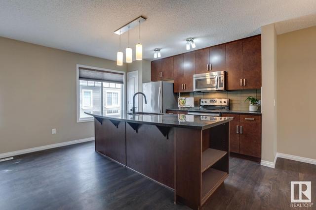 16 - 4050 Savaryn Dr Sw, House attached with 2 bedrooms, 2 bathrooms and null parking in Edmonton AB | Image 12