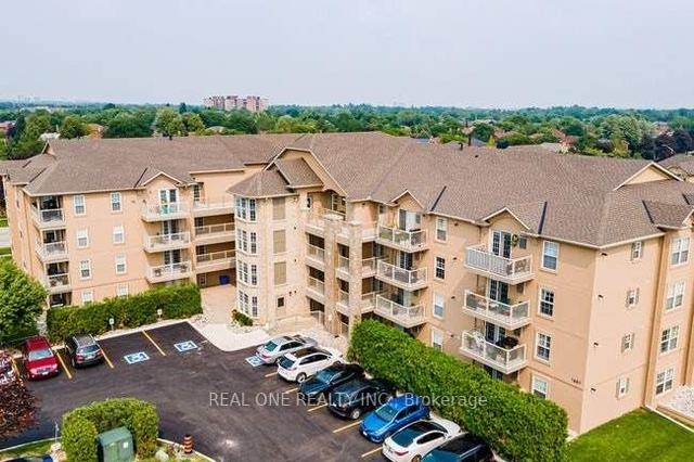 212 - 1460 Bishops Gate, Condo with 3 bedrooms, 2 bathrooms and 3 parking in Oakville ON | Image 1