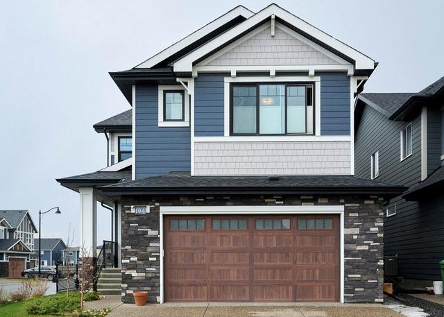 194 West Grove Way Sw, House detached with 4 bedrooms, 3 bathrooms and 2 parking in Calgary AB | Image 2