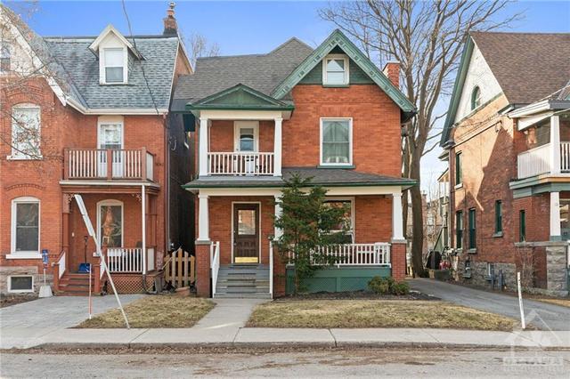 A RARE FIND! TRIPLEX in the heart of the city. Excellent location on a nice street. Opportunity knocking for investors with 3 large units. Each unit features good income and tenants. | Image 2