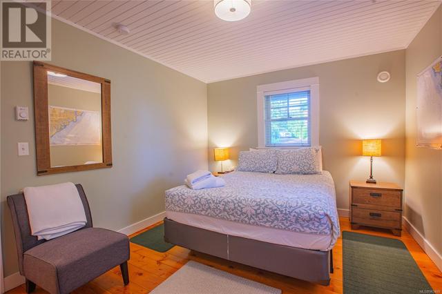 225 Boardwalk Blvd, House detached with 2 bedrooms, 1 bathrooms and 2 parking in Ucluelet BC | Image 22