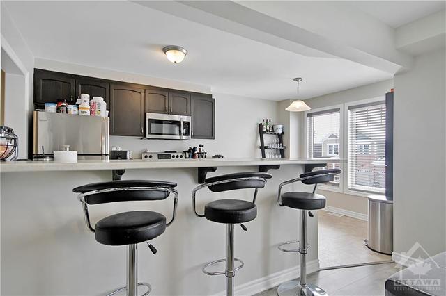 711 Juneberry Lane, Townhouse with 3 bedrooms, 2 bathrooms and 2 parking in Ottawa ON | Image 12
