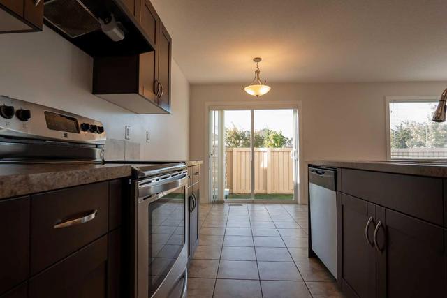 1 - 213 Silkstone Rd W, Home with 3 bedrooms, 2 bathrooms and 2 parking in Lethbridge AB | Image 9