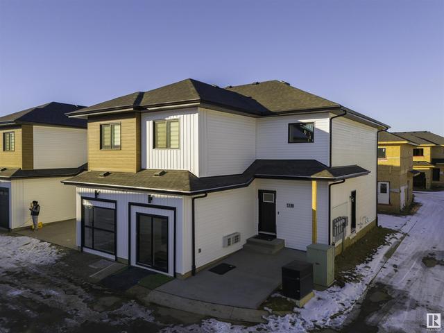 61 - 130 Hawks Ridge Bv Nw, House attached with 4 bedrooms, 3 bathrooms and null parking in Edmonton AB | Image 1