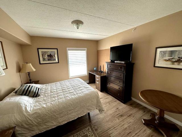 302 - 203 Centre St N, Condo with 1 bedrooms, 1 bathrooms and 1 parking in Sundre AB | Image 9