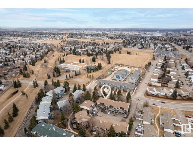 1035 Millbourne Rd E Nw, House attached with 3 bedrooms, 1 bathrooms and 2 parking in Edmonton AB | Image 3