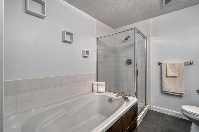 207 - 1818 14 St Sw, Condo with 2 bedrooms, 2 bathrooms and 1 parking in Calgary AB | Image 11
